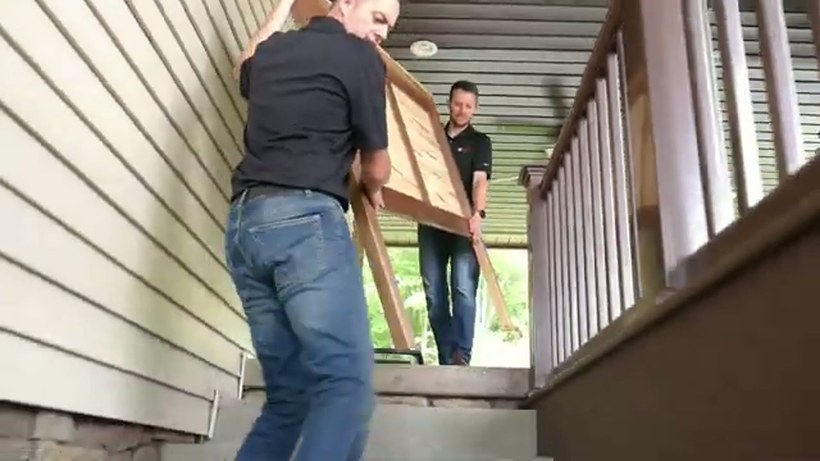 Ava's Moving Service crew handling a piece on a Rhode Island job