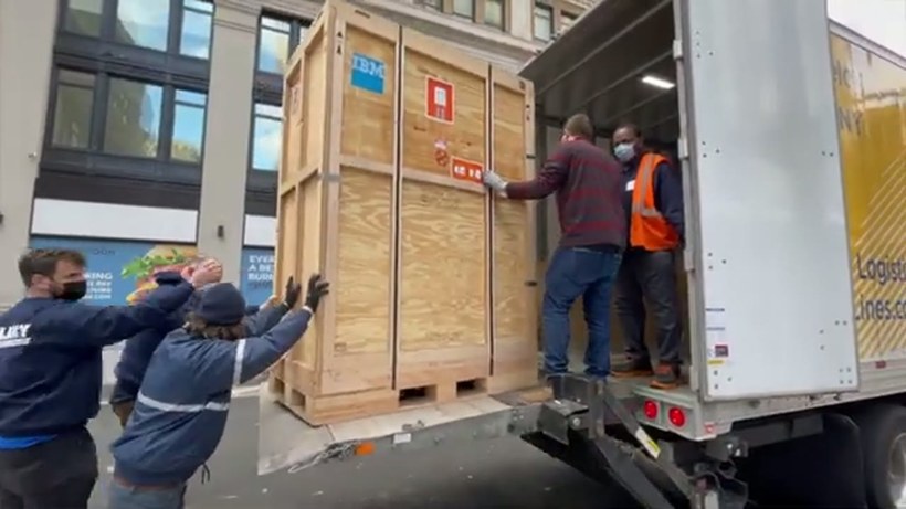 Ava's Moving Service crew handling a piece on a Rhode Island job