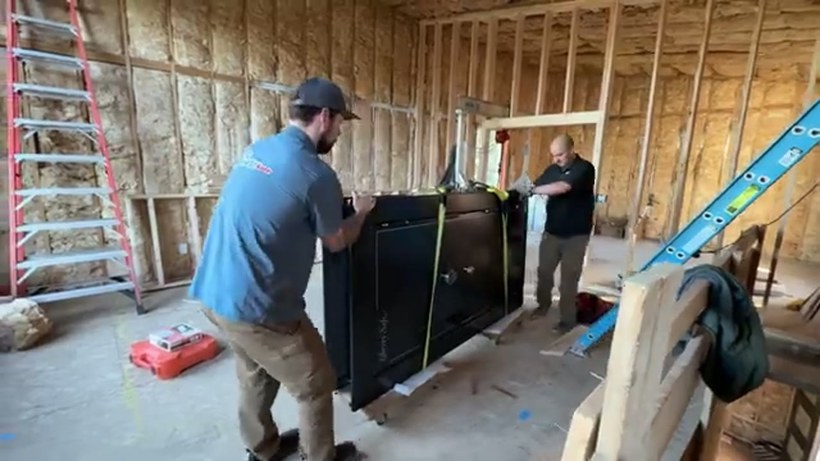 Ava's Moving Service crew handling a piece on a Rhode Island job